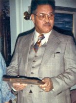 Fire Chief Lewis with plaque